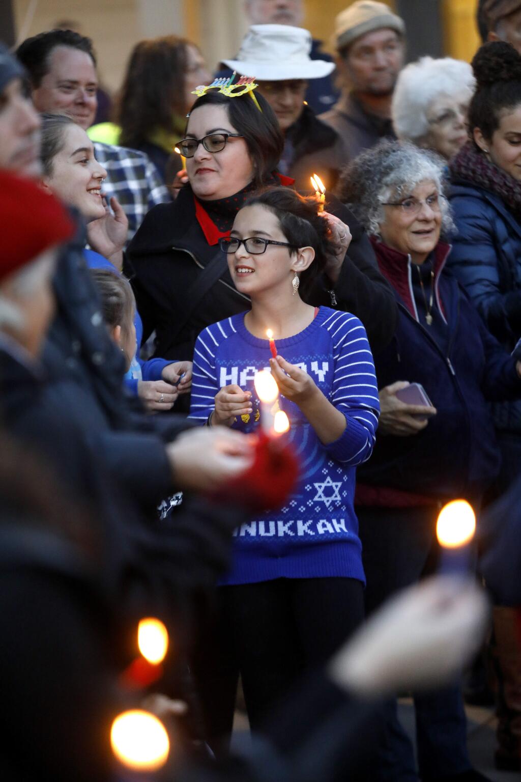 Amelia Fichera, 10, attends the Montgomery Village Chanukah Festival hosted by the Chabad Jewish Center in Santa Rosa on Sunday, December 2, 2018. (BETH SCHLANKER/ The Press Democrat)