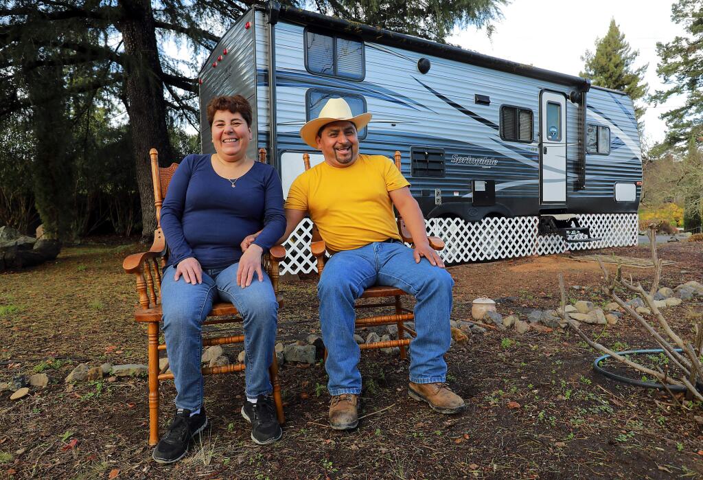 Emigdio Olivera, a vineyard supervisor with Redwood Empire Vineyard Management and his wife Celia lost their rental home when the owners moved in after losing their home in the fires. The Sonoma County Winegrowers Foundation and Sonoma County Farm Bureau set up an ag fund to purchase a new trailer for the couple to live in. (photo by John Burgess/The Press Democrat)