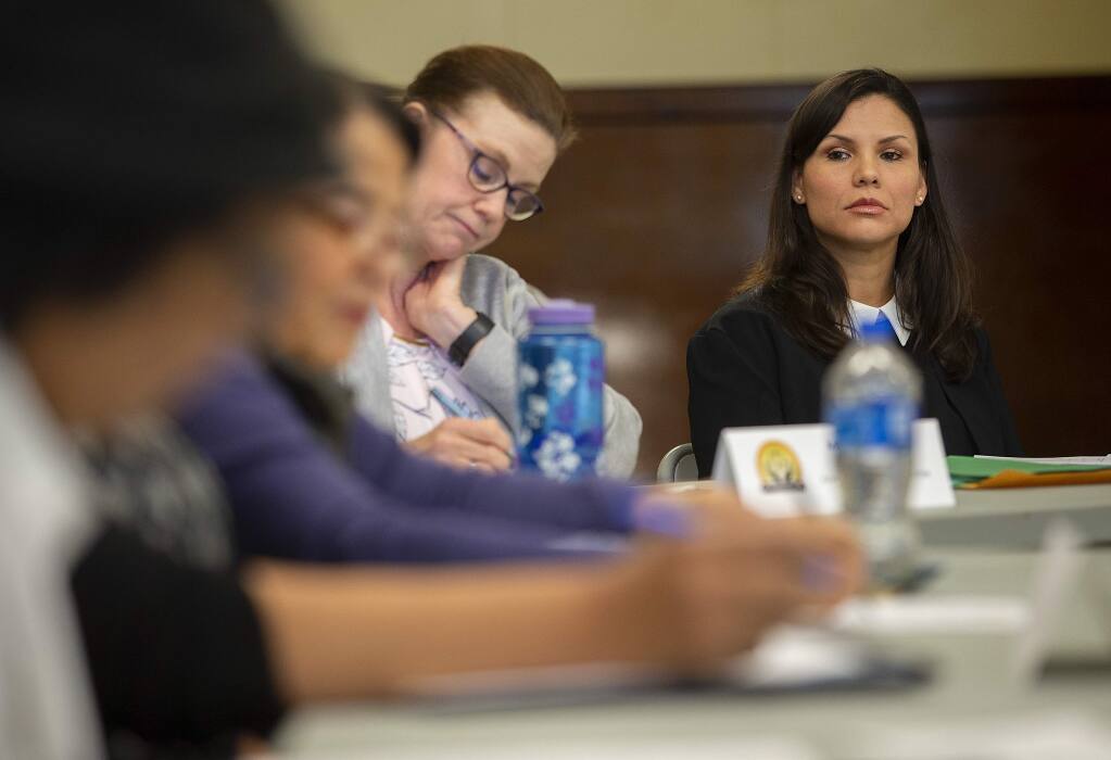 Karlene Navarro, right, the director of the Sonoma County Independent Office of Law Enforcement Review and Outreach (IOLERO), attends a Community Advisory Council meeting in Windsor on Monday, May 6, 2019. (John Burgess / The Press Democrat)