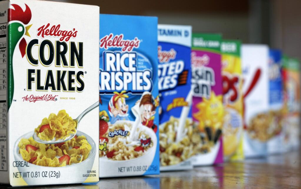 FILE - This Feb. 1, 2012, file photo, shows Kellogg's cereal products, in Orlando, Fla. Conservative media outlet, Breitbart, is encouraging its readers to boycott Kellogg products after the cereal maker said it would no longer advertise on its site. The Kellogg Company cited “company values” in explaining its decision Tuesday, Nov. 29, 2016. On Wednesday, Breitbart launched a #DumpKelloggs petition calling for a boycott of the company. (AP Photo/John Raoux, File)