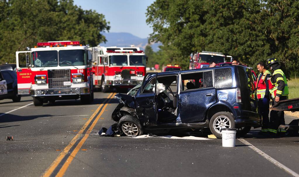 A head-on collision involving two vehicles at Highway 12 and Merced Avenue closed down part of Highway 12 in Santa Rosa on Monday, May 22, 2017. (CHRISTOPHER CHUNG/ PD)