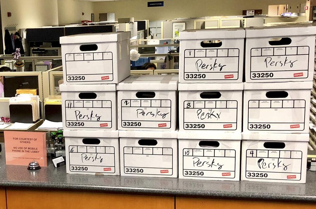 This photo released by John Shallman, shows boxes of petitions with signatures that call for the recall of Santa Clara County Judge Aaron Persky, a California judge who came under fire for his handling of a sexual assault case involving Stanford University swimmer Brock Turner, at the Santa Clara County Registrar of Voters office in San Jose, Calif., Thursday, Jan. 11, 2018. Stanford University law professor Michele Dauber said the campaign to remove submitted nearly 100,000 signatures on Thursday to get the recall on the June 2018 ballot. (John Shallman via AP)