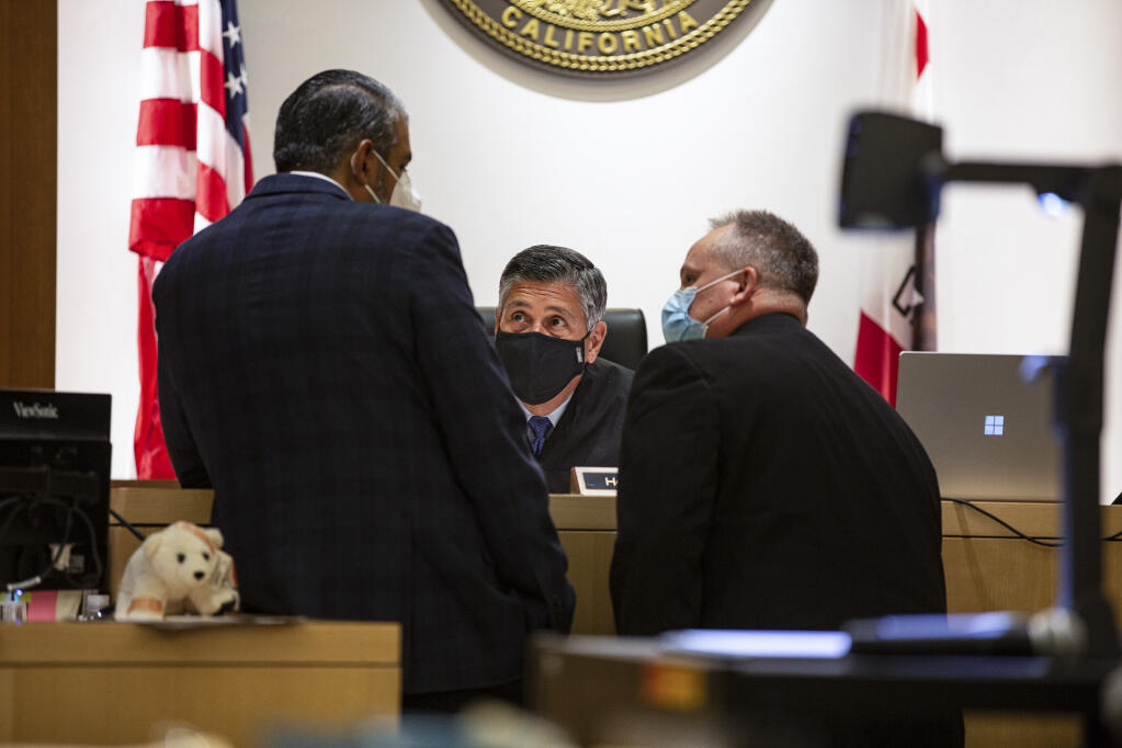 Lawyers address a judge in Madera County Superior Court in Madera on Tuesday, Sept. 29, 2021. Photo by Larry Valenzuela for CalMatters