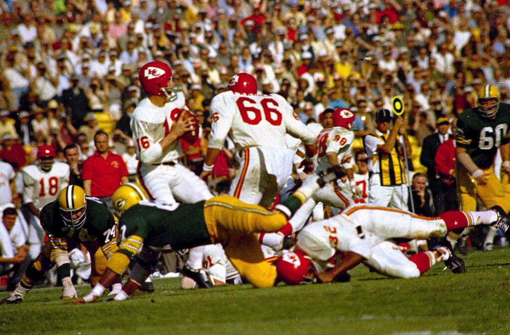 Kansas City Chiefs' quarterback Len Dawson (16) gets ready to release the ball during the first Super Bowl, Jan. 15, 1967, against the Green Bay Packers at the Los Angeles Coliseum. The Green Bay Packers won the game. (AP Photo)