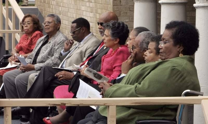 Nine students who in 1957 integrated Little Rock Central High School, from left, Thelma Mothershed Wair, Minnijean Brown Trickey, Jefferson Thomas, Terrence Roberts, Carlotta Wallls LaNier, Gloria Ray Karlmark, Ernest Green, Elizabeth Eckford, and Melba Pattillo Beals attend 50th anniversary commemoration of the event at the school in Little Rock, Arkansas, Tuesday, Sept. 25, 2007. (AP Photo/Danny Johnston)