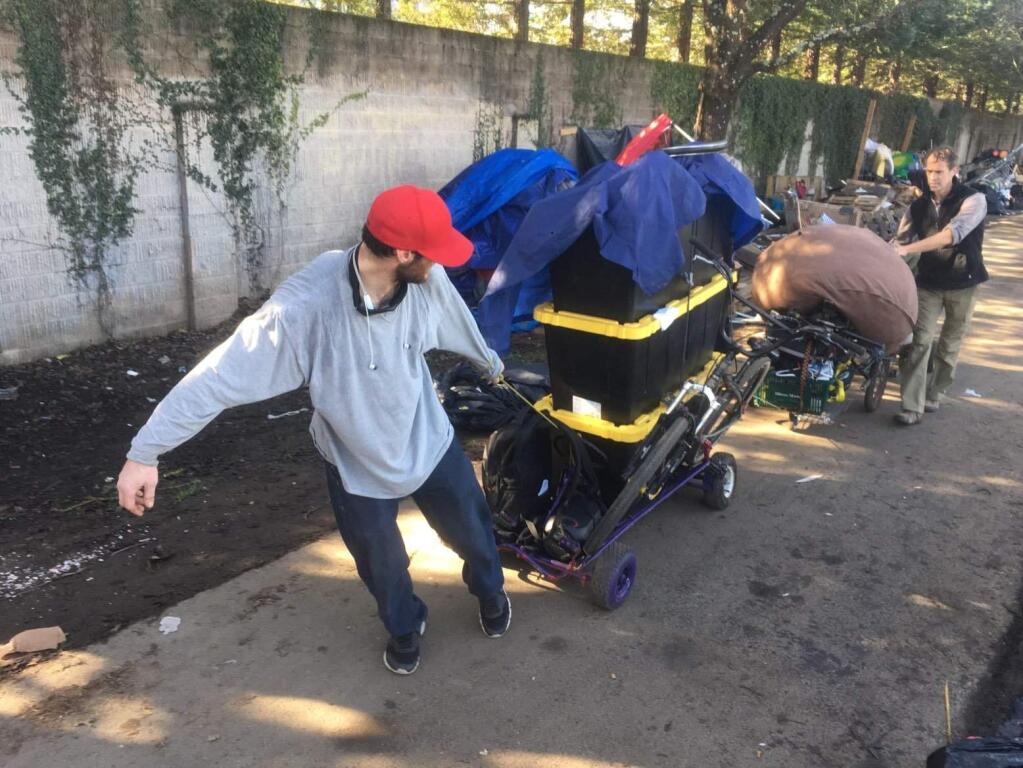 An unidentified man leaves the Joe Rodota Trail homeless camp in west Santa Rosa, Friday, Jan. 31, 2020. (JOHN BURGESS/ PD)