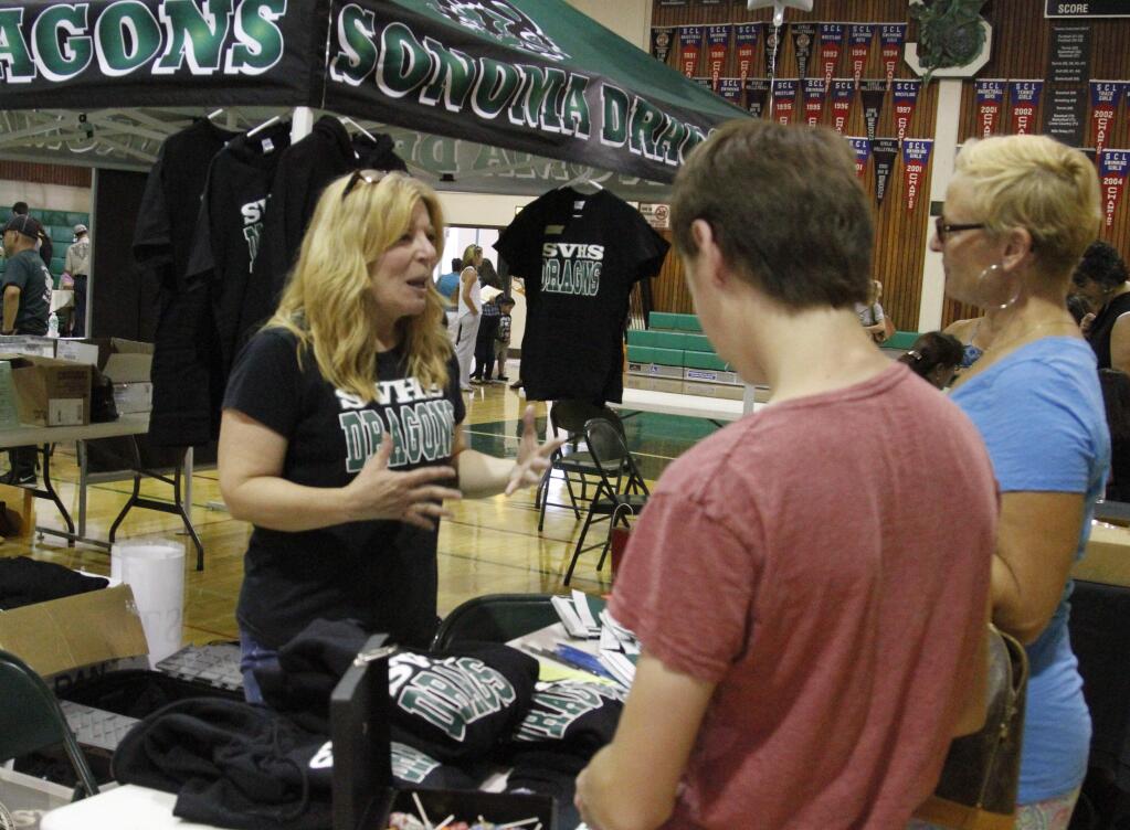 Bill Hoban/Index-Tribune file photoSonoma Valley High Booster President Alice Schimm talks about the Boosters at registration in 2015.