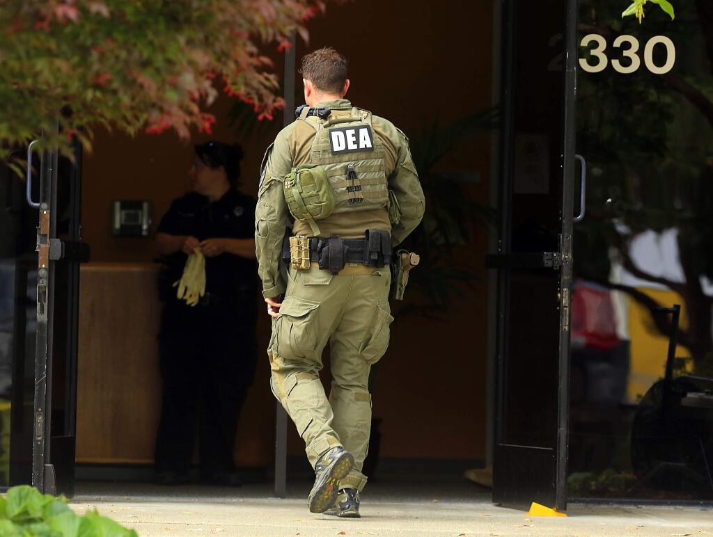 Santa Rosa Police coordinated three raids on illegal hash oil labs with help from the DEA on Wednesday morning including one in a business park on Circadian Way off Corporate Center Parkway. (JOHN BURGESS/The Press Democrat)