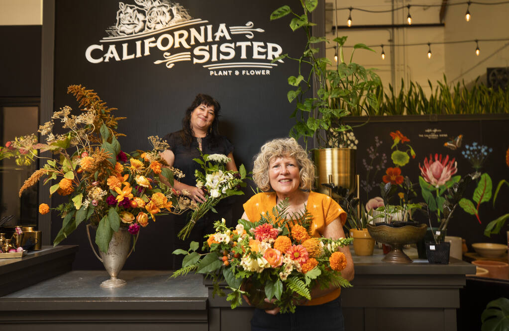 Owners Nichole Skalski, back, and Kathrin Green of California Sister Plant and Flower in Sebastopol. (John Burgess/The Press Democrat file, 2020)