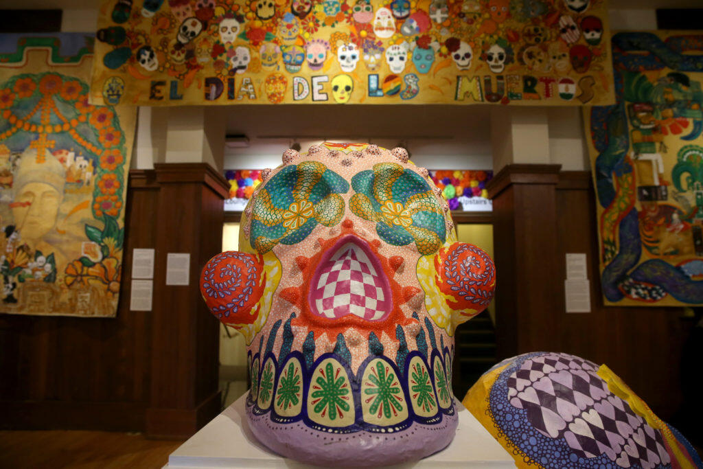 Decorated skulls and children’s artwork on the walls were on display during the Dia de los Muetros family day at the Sonoma County History Museum in Santa Rosa, California on Sunday, October 21, 2018 (BETH SCHLANKER/The Press Democrat)