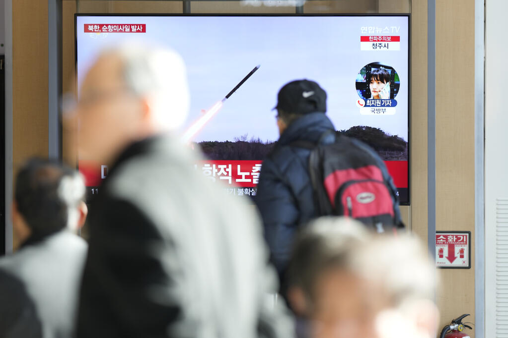 A TV screen shows a report of North Korea's cruise missiles with file footage during a news program at the Seoul Railway Station in Seoul, South Korea, Wednesday, Jan. 24, 2024. South Korea's military says North Korea fired several cruise missiles into waters off its western coast, adding to a provocative run of weapons demonstrations in the face of deepening nuclear tensions with the United States, South Korea and Japan. (AP Photo/Lee Jin-man)