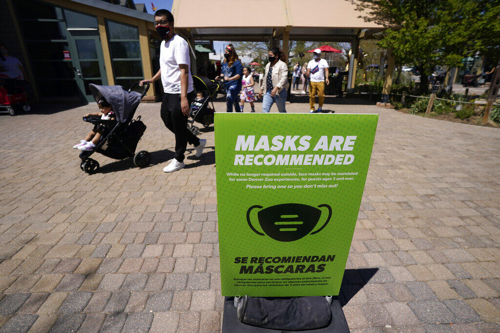 The Centers for Disease Control and Prevetnion loosened guidelines for vaccinated people, with masks no longer being necessary when outdoors or in most indoor situations. (DAVID ZALUBOWSKI / Associated Press)