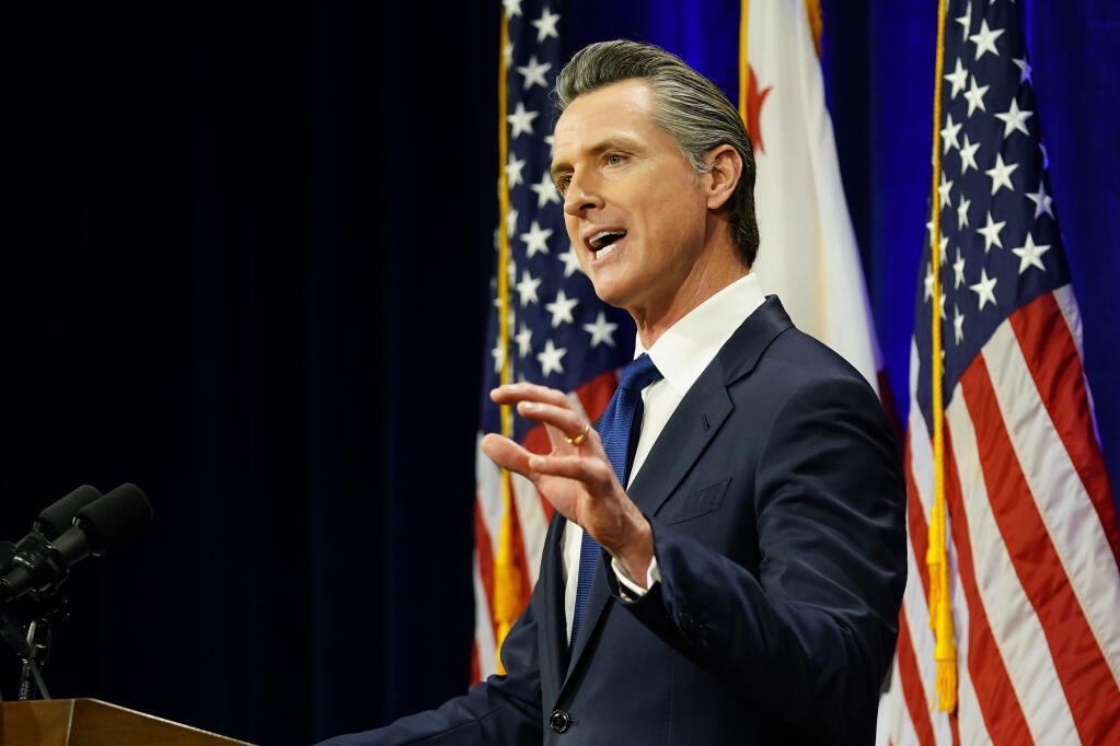 FILE -California Gov. Gavin Newsom delivers his annual State of the State address in Sacramento, Calif., Tuesday, March 8, 2022. (AP Photo/Rich Pedroncelli, File)