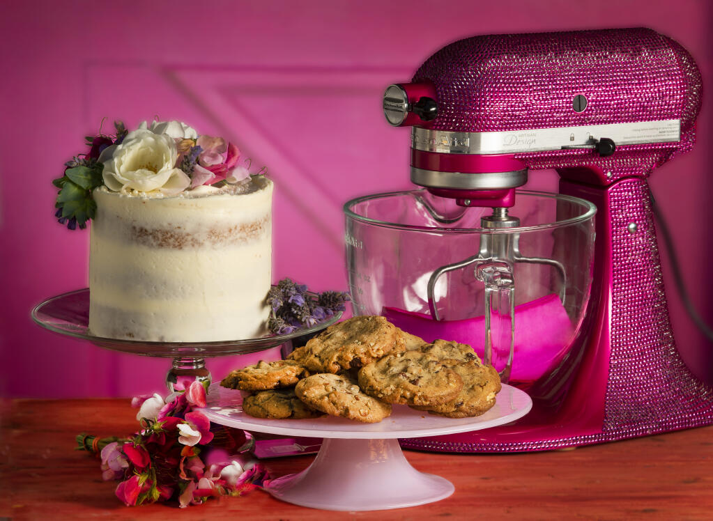 Lady Grey Cake with Earl Grey tea and a lavender buttercream, decorated with fresh flowers, left; and Bourbon Brown Butter Chocolate Chip Cookies with Pecans from Cloverdale Flour Girl Shannon Moore.  (John Burgess/The Press Democrat)