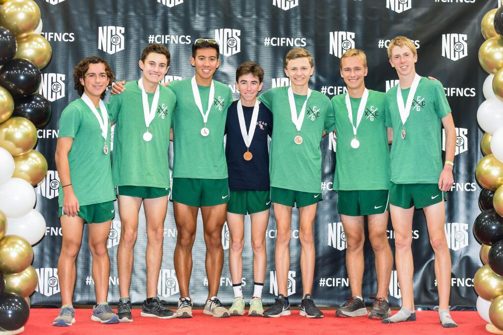 ELIZABETH BAIRD PHOTOGRAPHYRunning their way to state by finishing third in the NCS championship meet were Casa Grande runners, left to right, Aaron Beaube, Logan Moon, Andrew Gotshall, Nolan Hosbein, Jake Dietlin, Luke Baird and Will Hite .