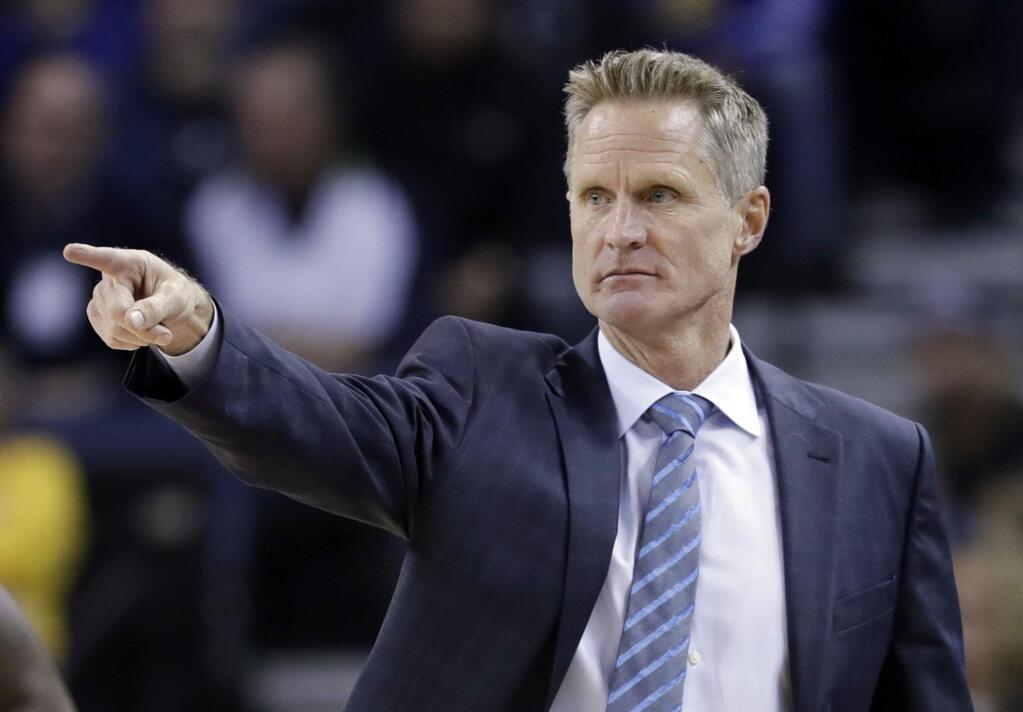 In this Monday, Nov. 28, 2016 file photo, Golden State Warriors head coach Steve Kerr directs his team during the first half against the Atlanta Hawks in Oakland. (AP Photo/Marcio Jose Sanchez, File)
