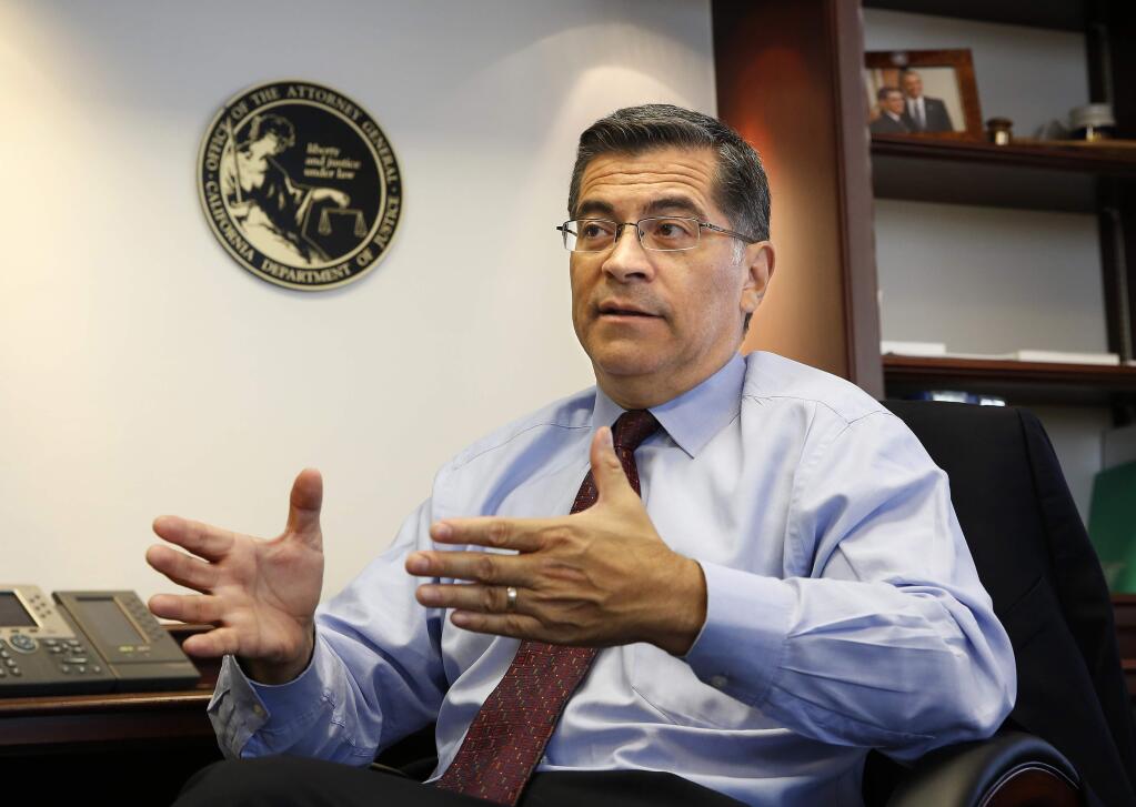 Attorney General Xavier Becerra discusses various issues during an interview with the Associated Press in Sacramento. (RICH PEDRONCELLI / Associated Press)