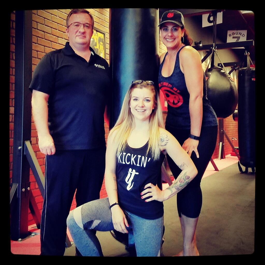 SUBMITTED PHOTO9 Round Fitness owner Philip Grainger with general manager Rachael Dundum-Holt and (front) tainer Chelsee Spangler. The team also includes Jake Haas (not pictured)