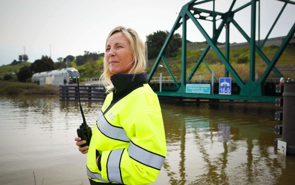 Petaluma, CA, USA. Friday, March 10, 2017._ Cathy Howell is in charge of raising and lowering the bridge where the SMART train crosses the Petaluma River.(CRISSY PASCUAL/ARGUS-COURIER STAFF)