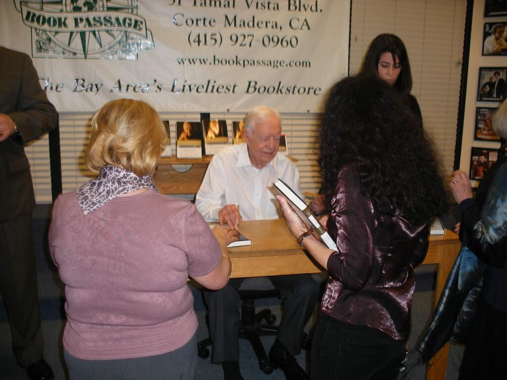 Book Passage owner Elaine Petrocelli averaged about 1,000 community events a year between her Corte Madera and San Francisco stores before the coronavirus lockdown in mid-March 2020. In one such event, she hosted former U.S. President Jimmy Carter, seen in this photo. Now she relies on the virtual world to continue a presence in the community. (Elaine Petrocelli photo)