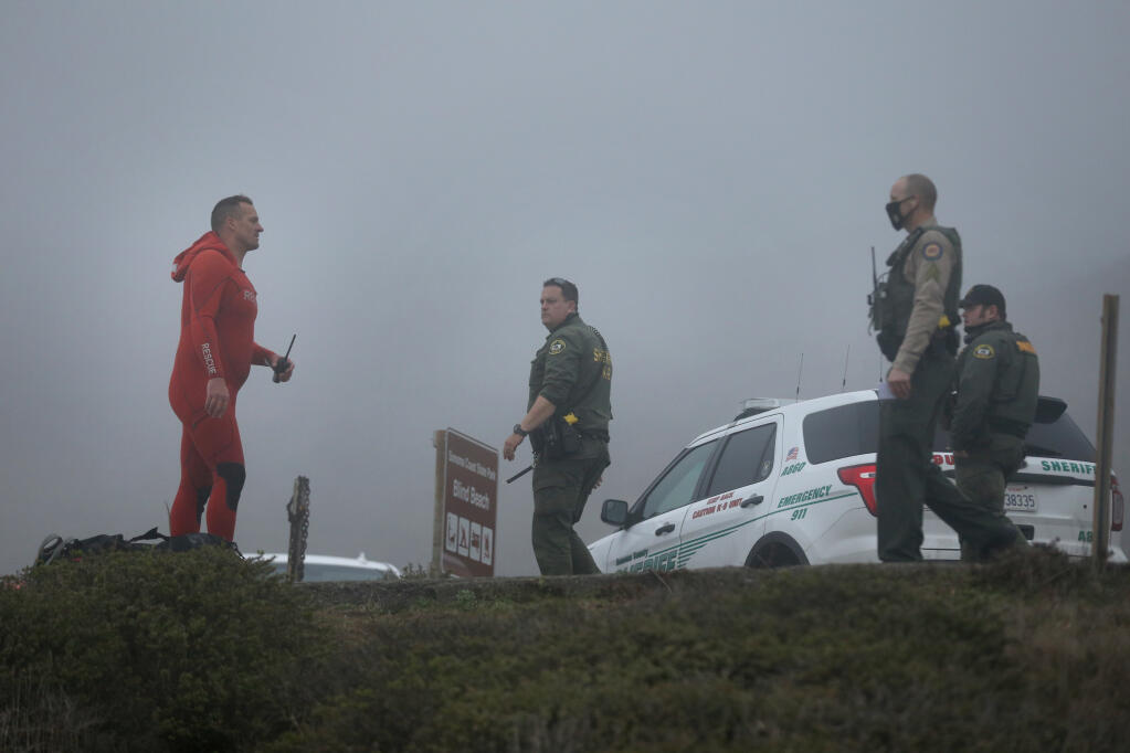 Fire and law enforcement personnel conduct a search and recovery operation for two children at Blind Beach south of Jenner, California, on Sunday, January 3, 2021. (Beth Schlanker/The Press Democrat)