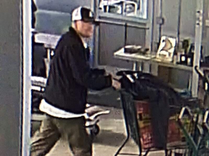An image from surveillance video shows the burglary suspect leaving the Petaluma store. (PETALUMA POLICE DEPARTMENT)
