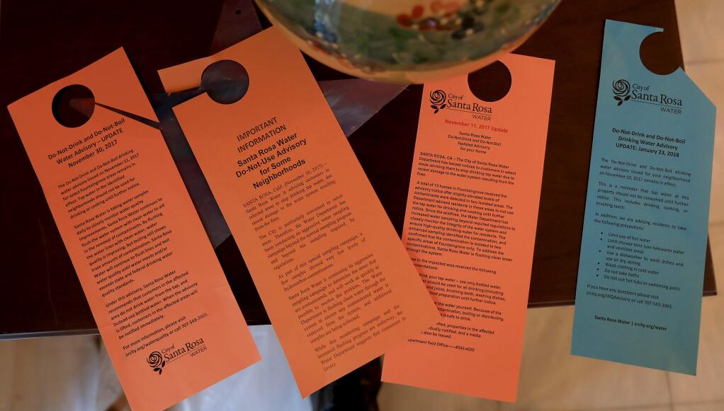 Several notices about the condition of drinking water have been given out in areas of Fountaingrove, Wednesday Jan. 24, 2018 where homes survived the October firestorm. The contaminant benzene has been found in the drinking water. (Kent Porter / Press Democrat) 2018