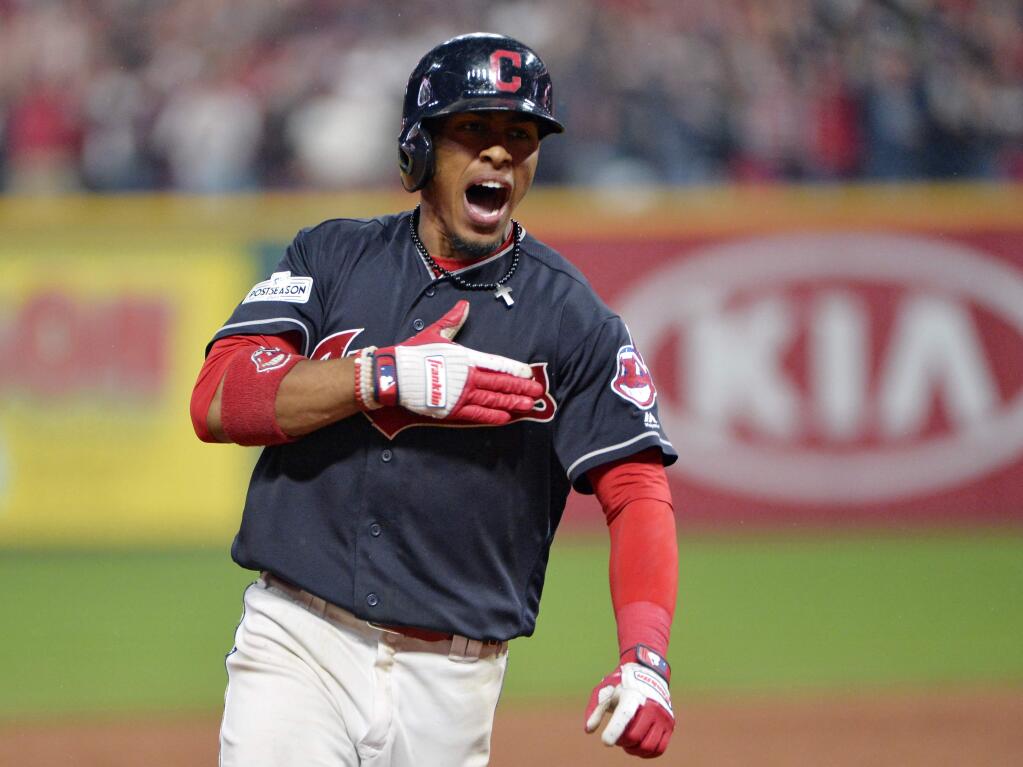 Cleveland Indians' Francisco Lindor reacts after hitting a grand slam off New York Yankees relief pitcher Chad Green during the sixth inning of Game 2 of a baseball American League Division Series, Friday, Oct. 6, 2017, in Cleveland. (AP Photo/Phil Long)
