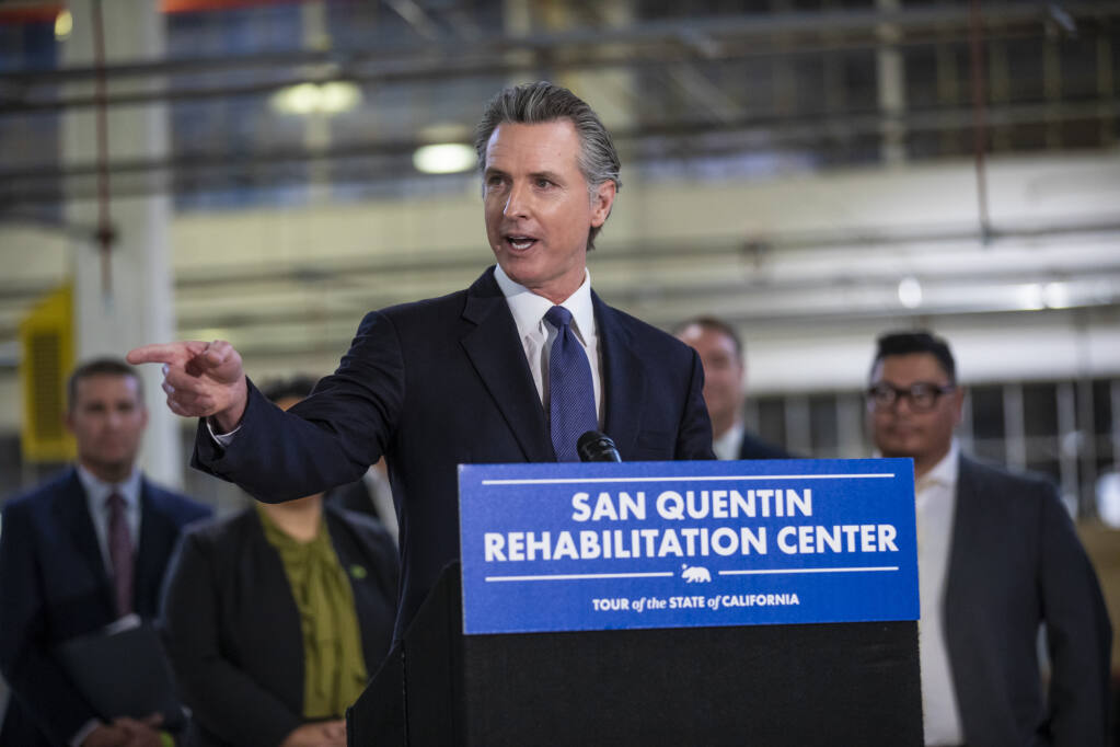 Gov. Gavin Newsom speaks at San Quentin State Prison announcing that the facility will be transformed to focus on training and rehabilitation on March 17, 2023. Photo by Martin do Nascimento, CalMatters