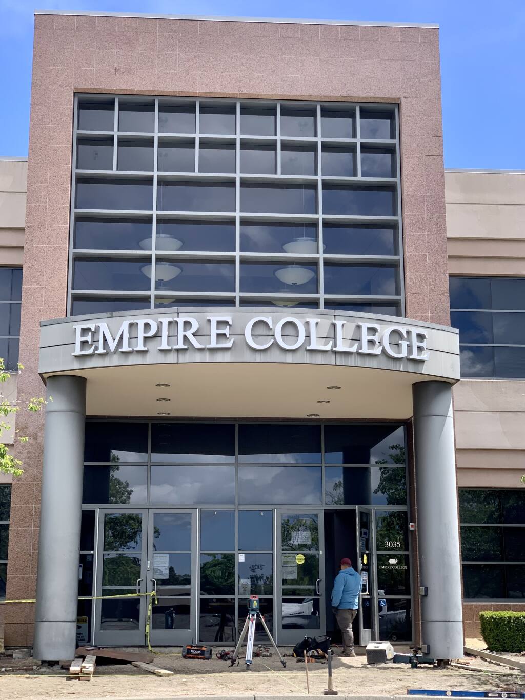 A work crew prepares the first floor of the Empire College building at 3035 Cleveland Ave. in Santa Rosa on Monday, May 9, 2022, for Eye Care Institute, which is consolidating other Sonoma County locations there in June. After the closing of the School of Business, effective at the end of 2021, the School of Law will occupy part of the second floor. (Jeff Quackenbush / North Bay Business Journal)