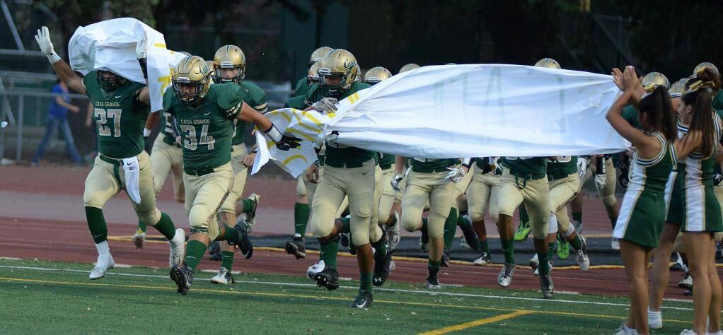 Casa Grande takes the field before their football game against Analy at Santa Rosa High School on Friday, August 28, 2015.