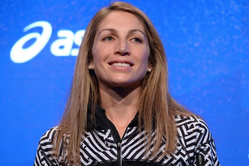 Sara Hall, shown at a media event before the 2016 New York City Marathon, donated her $10,000 bonus to the Hall Foundation. (Anthony Behar / Sipa USA)