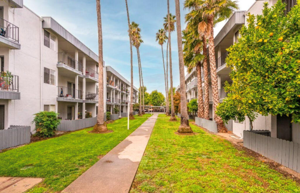 The 74-unit Nueva Vista Apartments complex at 1333 W. Steele Lane near Coddingtown Mall in Santa Rosa was built in 1966. Montgomery Partners led the purchase of the property, now called The Palms at Coddingtown, in April for $14.75 million. (Courtesy: Montgomery Partners)