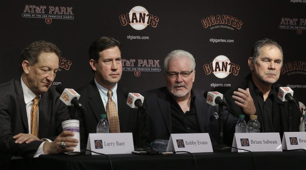 San Francisco Giants Executive Vice President of Baseball Operations Brian Sabean, second from right, gestures while speaking at a media conference beside, from left, Giants President and CEO Larry Baer, Senior Vice President and General Manager Bobby Evans and manager Bruce Bochy, right, on Thursday, Oct. 13, 2016, in San Francisco. The Giants lost to the Chicago Cubs in the National League Division Series. (AP Photo/Ben Margot)