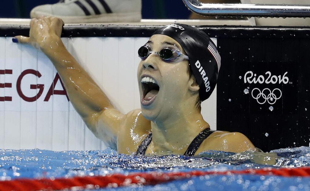 United States' Maya DiRado celebrates after winning the gold medal in the women's 200-meter backstroke final during the swimming competitions at the 2016 Summer Olympics, Friday, Aug. 12, 2016, in Rio de Janeiro, Brazil. (AP Photo/Michael Sohn)