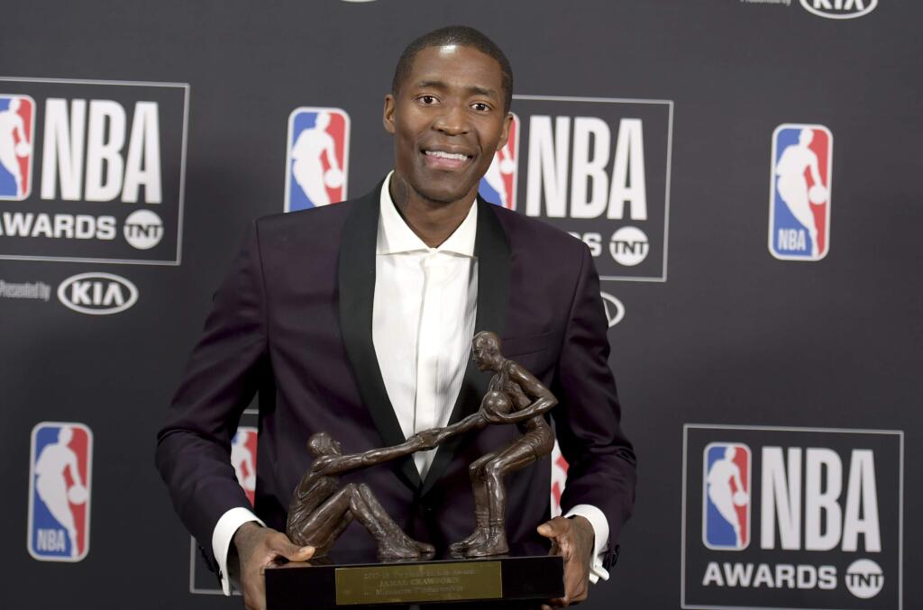 Jamal Crawford, of the Minnesota Timberwolves, poses in the press room with the Twyman‚ÄìStokes teammate of the year award at the NBA Awards on Monday, June 25, 2018, at the Barker Hangar in Santa Monica, Calif. (Photo by Richard Shotwell/Invision/AP)