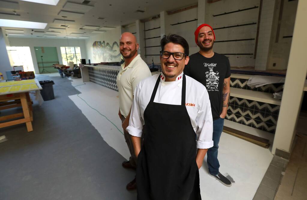 From left, co-owners Amos Flint, Jose Navarro and bar manager Danny Ojinaga are nearly ready to open their new restaurant Vertice on Courthouse Square in Santa Rosa. (John Burgess/The Press Democrat)