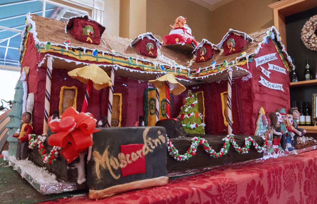 Robbi Pengelly/Index-TribuneMuscardini Winery celebrates the historic Kenwood School house that is now home to its tasting room, by replicating the 1800s era building in a fanciful gingerbread creation. 