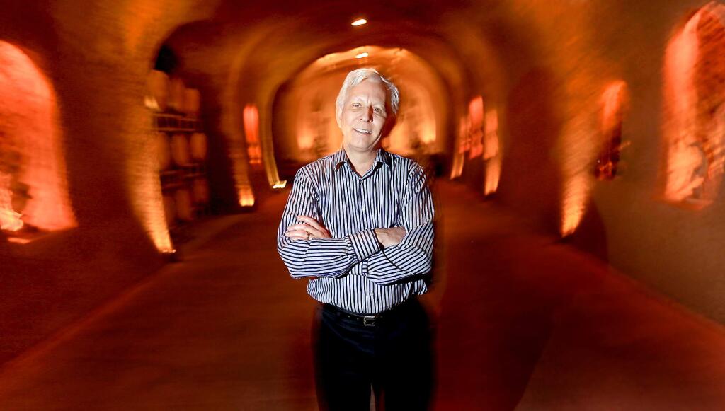 Pat Roney, president of Vintage Wine Estates of Santa Rosa, who acquired Clos Pegase Winery and Vineyards in Calistoga in 2013, stands in the Close Pegase wine cave. (Kent Porter / Press Democrat) 2013