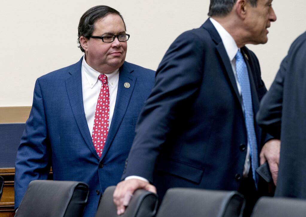 Rep. Blake Farenthold, R-Texas, arrives for a House Committee on the Judiciary oversight hearing on Capitol Hill, Wednesday, Dec. 13, 2017, in Washington. Texas GOP Rep. Blake Farenthold says won't seek re-election next year. The lawmaker is under pressure from sexual misconduct allegations that surfaced three years ago but have come under renewed focus. (AP Photo/Andrew Harnik)