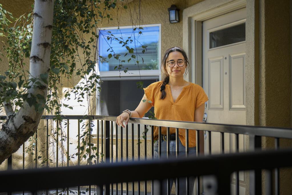 Aralyn Tucker outside of her condo in Natomas on June 11, 2022. Photo by Julie Hotz for CalMatters
