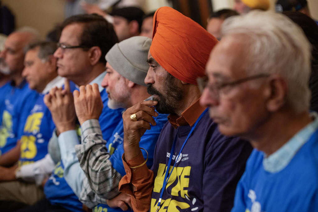 People listen to testimony at the Assembly Judiciary Hearing for SB 403 at the state Capitol in Sacramento on July 5, 2023. Photo by Semantha Norris, CalMatters