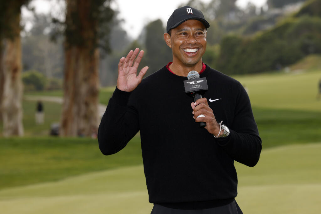 Tiger Woods speaks during the trophy ceremony on the 18th green after the Genesis Invitational golf tournament at Riviera Country Club, Sunday, Feb. 20, 2022, in the Pacific Palisades area of Los Angeles. (AP Photo/Ryan Kang)