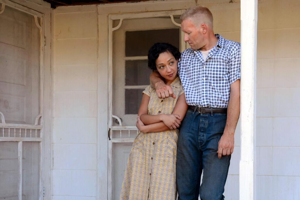 This image released by Focus Features shows Ruth Negga, left, and Joel Edgerton in a scene from, 'Loving.' (Ben Rothstein/Focus Features via AP)