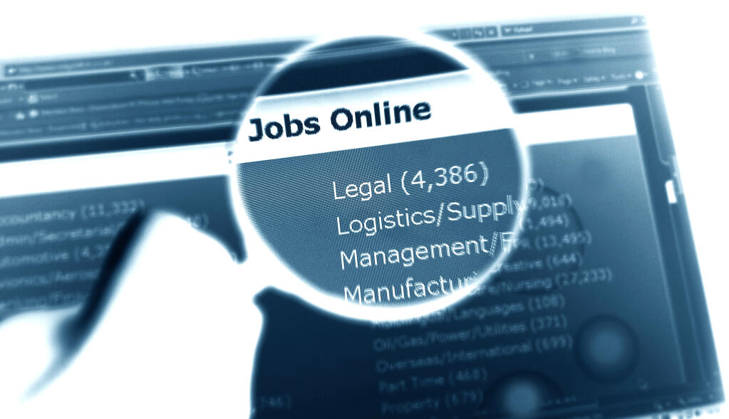 A magnifying glass over a computer screen shows "Jobs Online" then a list of job categories.