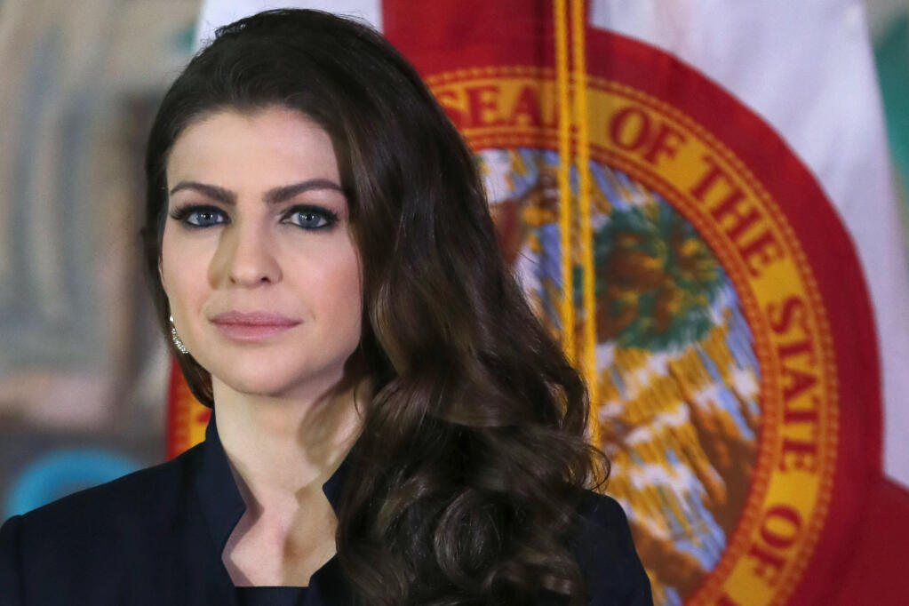 In this Wednesday, Jan. 9, 2019 file photo, Casey DeSantis is shown during a news conference, Wednesday, Jan. 9, 2019, in Miami. Florida First Lady Casey DeSantis has breast cancer, her husband Gov. Ron DeSantis announced Monday. (AP Photo/Wilfredo Lee, File)