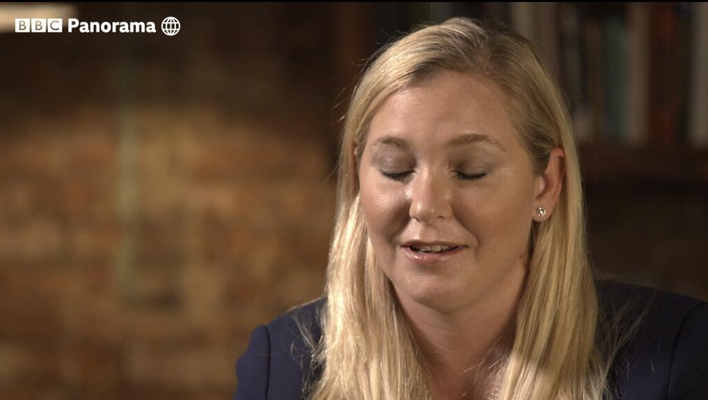 In this image taken from video issued by the BBC, Virginia Roberts Giuffre closes her eyes during an interview on the BBC Panorama program that will be aired on Monday Dec. 2, 2019. Roberts Giuffre says she was a trafficking victim made to have sex with Prince Andrew when she was 17 is asking the British public to support her quest for justice. She tells BBC Panorama in an interview to be broadcast Monday evening that people 'should not accept this as being OK.' Giuffre's first UK television interview on the topic describes how she was trafficked by notorious sex offender Jeffrey Epstein and made to have sex with Andrew three times, including once in London. (BBC Panorama via AP)