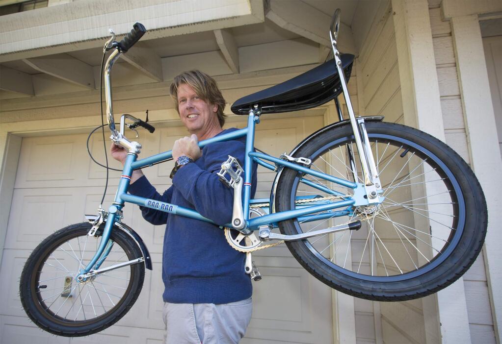 Erik Ran with one of his banana-seat, high-end bicycles. (Photo by Robbi Pengelly/Index-Tribune)