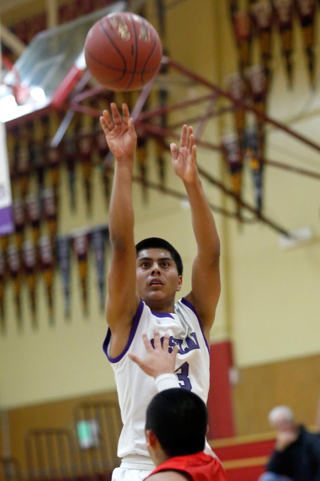 Roseland Prep's Pablo Avendano (3) shoots the ball during a game in December 2015. Avendano was selected by league coaches as the 2016 NCL II All-League Boys Basketball Most Valuable Player. (Alvin Jornada / The Press Democrat)