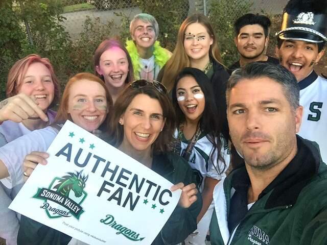 SVHS Vice Principal Andrew Ryan takes a selfie with students and Vice Principal Jessica Hutchinson showing their school spirit prior toa Dragon's home football game.